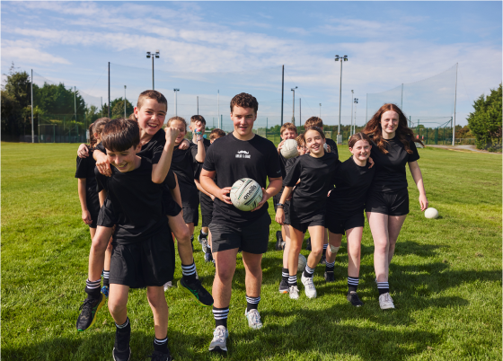 Children playing in a rugby field